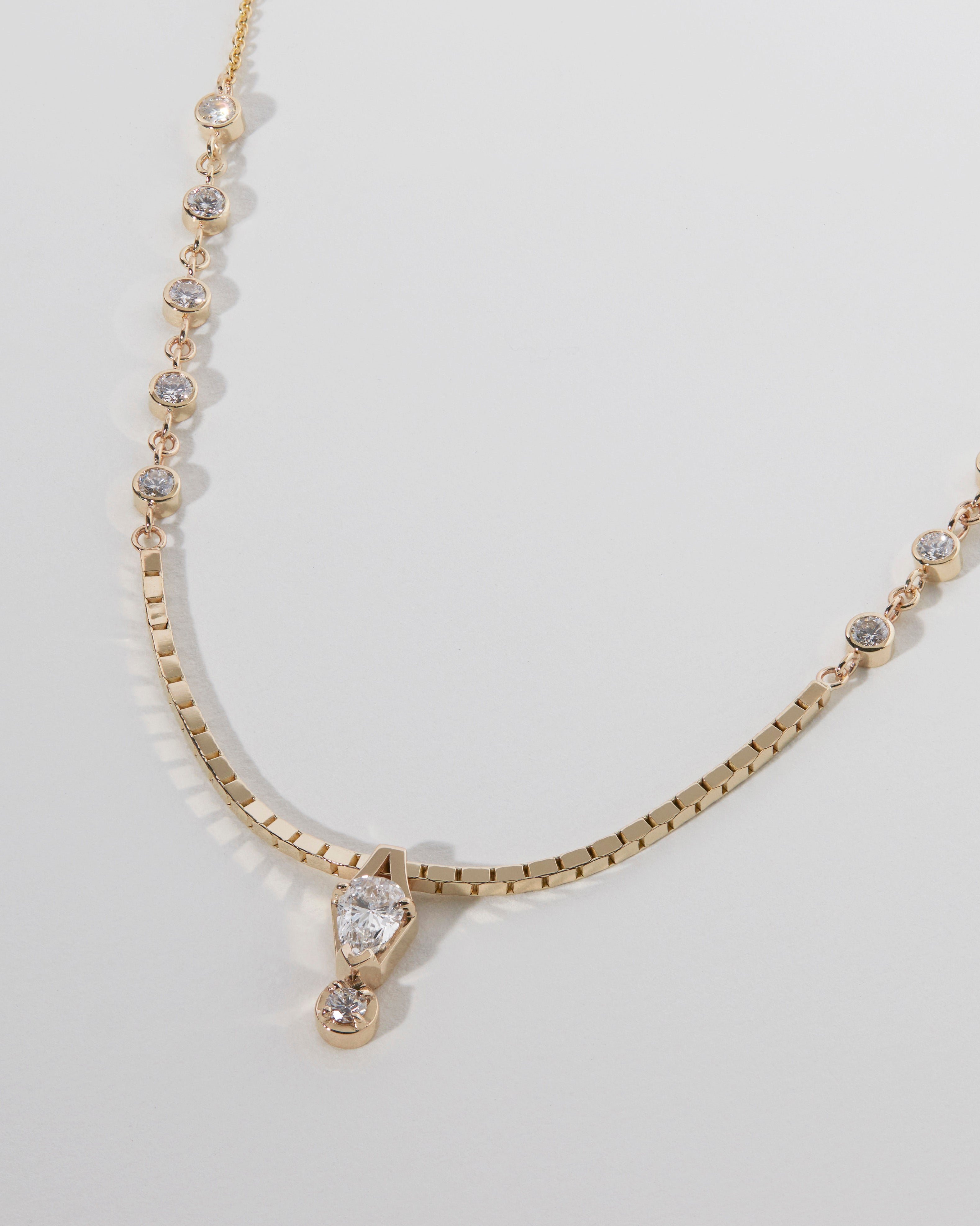 Luxury Custom Designs featuring a variety of exquisite jewelry including a Custom Earring Sleeve, Re-New Necklace, Jade Heart Pendant, and elegantly crafted Custom Rings, Necklaces, and Earrings.