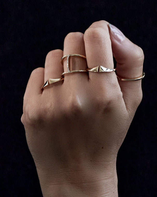 Kaleidoscope Mini Nuance Ring worn on a hand, elegantly showcasing its beauty and artisanal craftsmanship in a luxurious 18k Fairmined Gold finish.