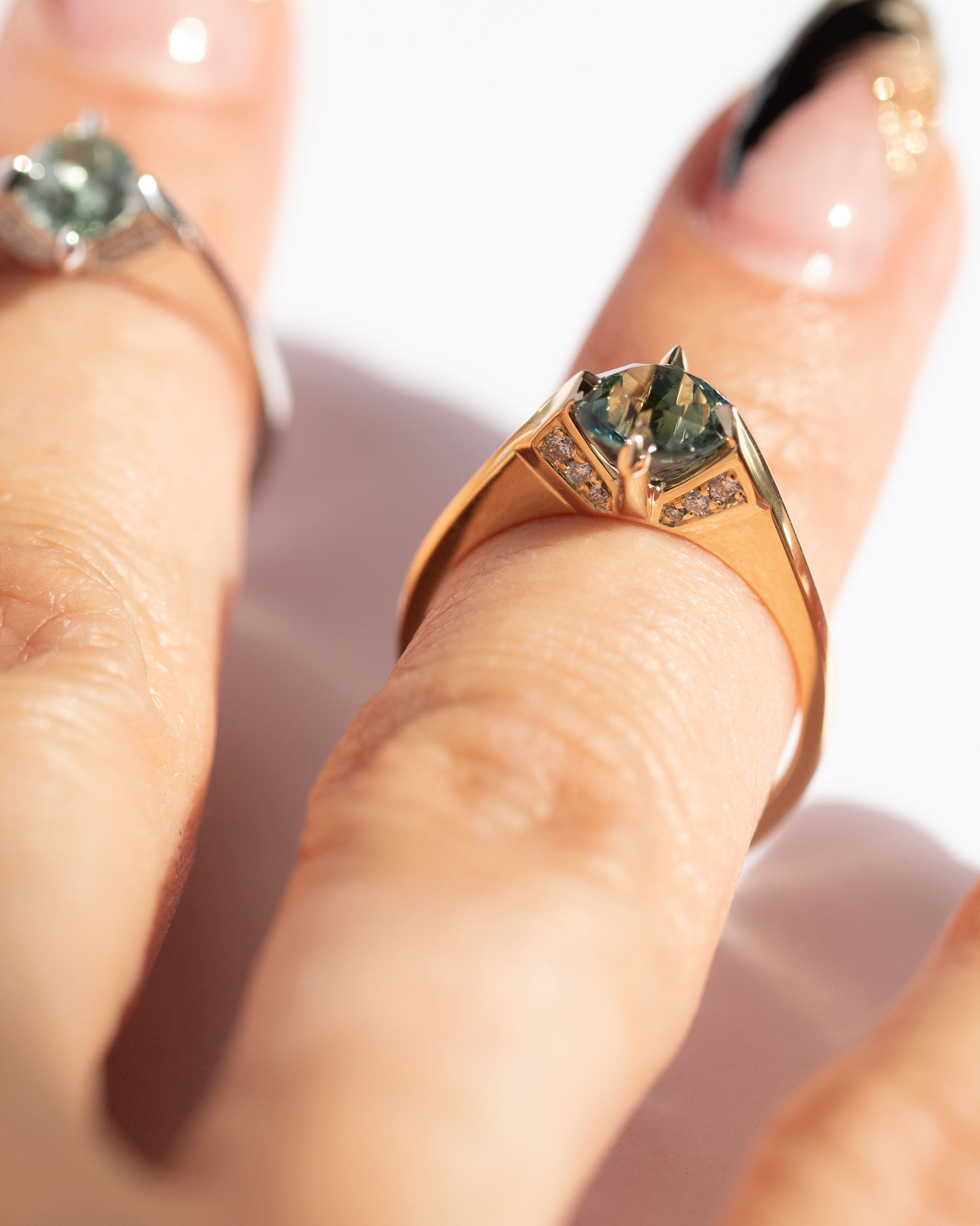 Enchanting minimalist gold rings displayed together, illustrating the different styles and designs including minimalist arc, minimalist rise, and minimalist pave by Bliss Lau.