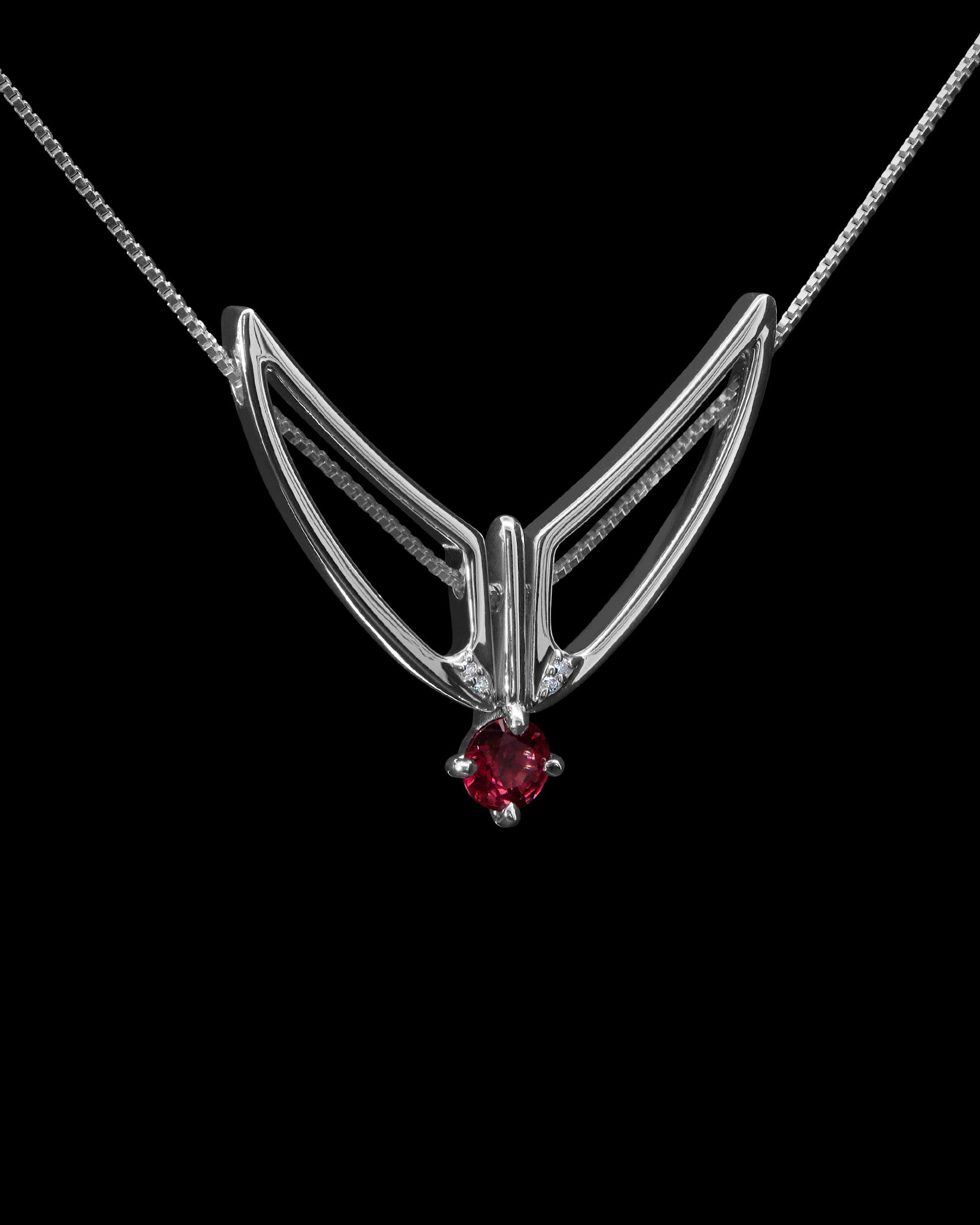 Lifestyle image featuring the Hype Women x Bliss Lau Attune Silver Necklace With Garnet, encapsulating the essence of femininity in a women’s silver necklace.