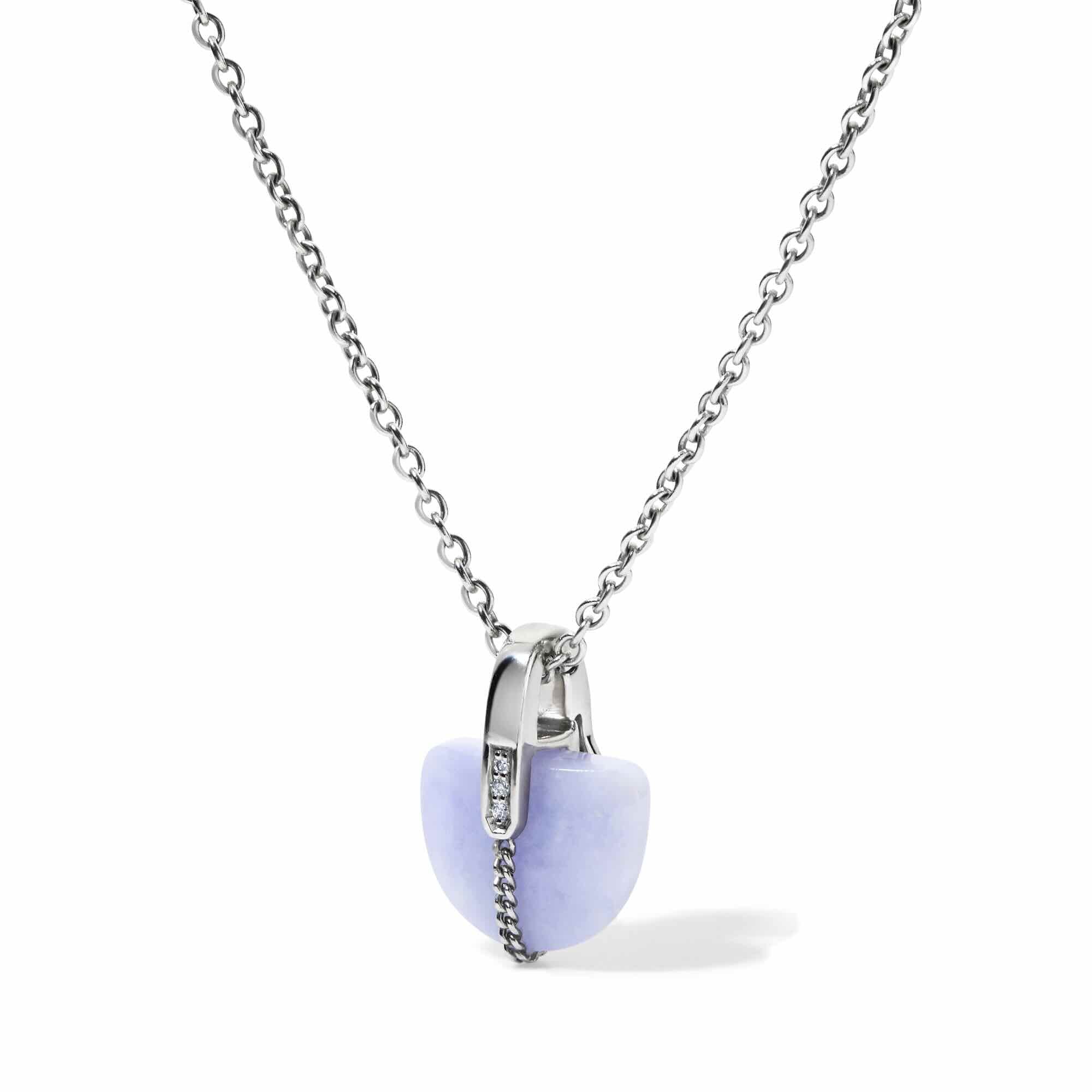 Side view of platinum necklace with a half-moon shaped lavender jade pendant on a white background