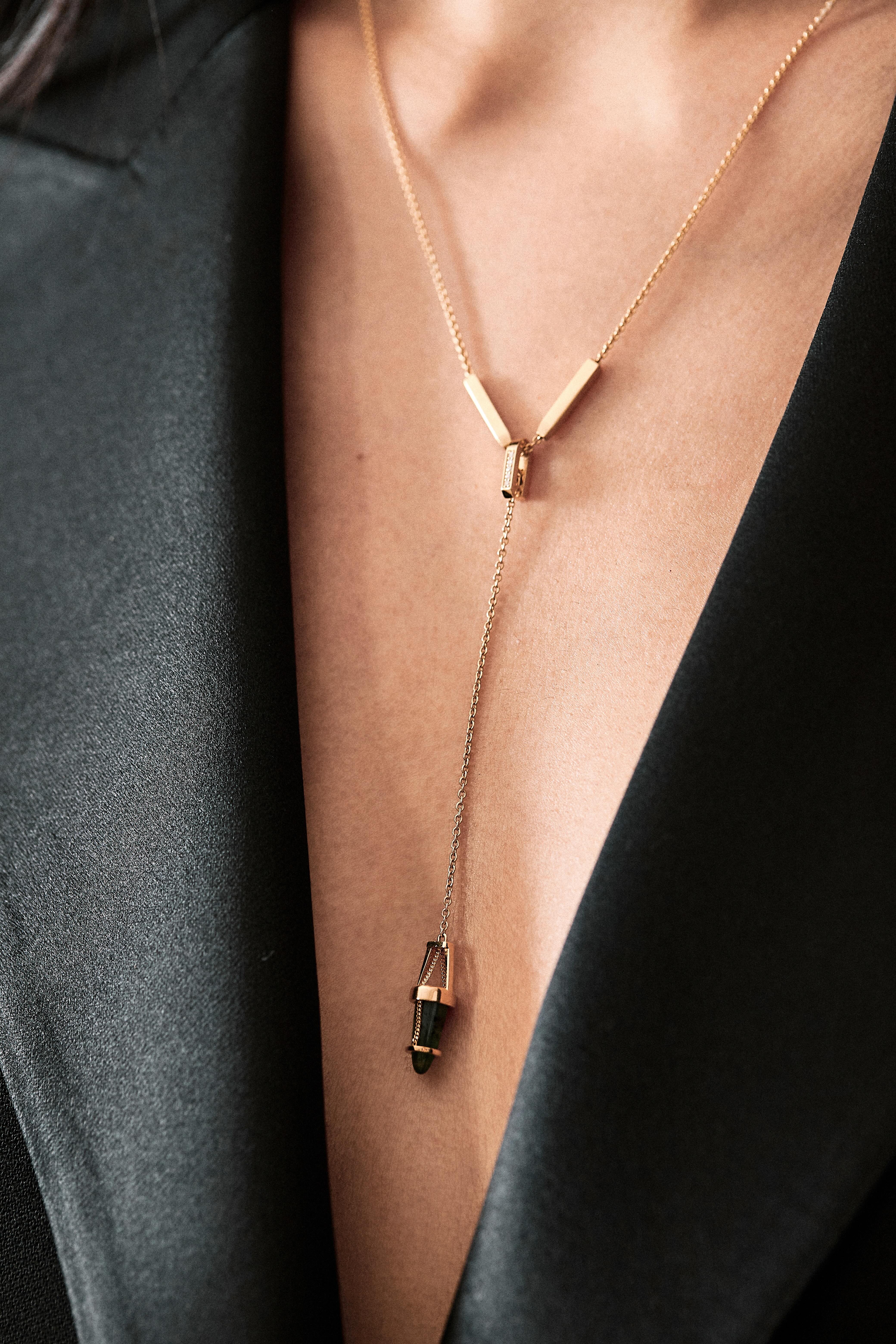 Open Gold Necklace elegantly worn, highlighting the interplay of handcrafted beams and additional elements, designed by Bliss Lau.