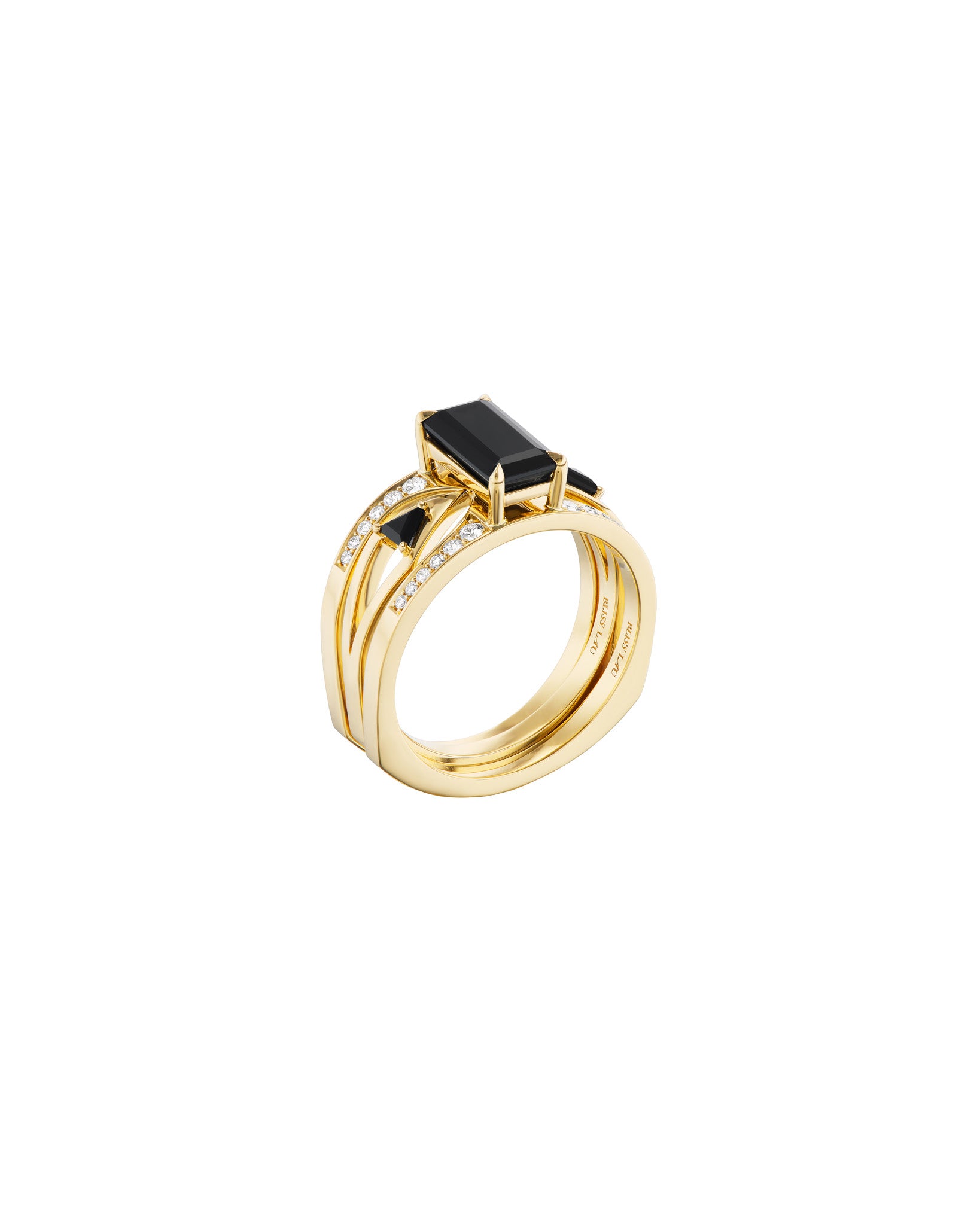 Elegant side view of the Mirage + Reflection Ring Set in 18K yellow gold by Bliss Lau, highlighting the beautiful black spinel gems.