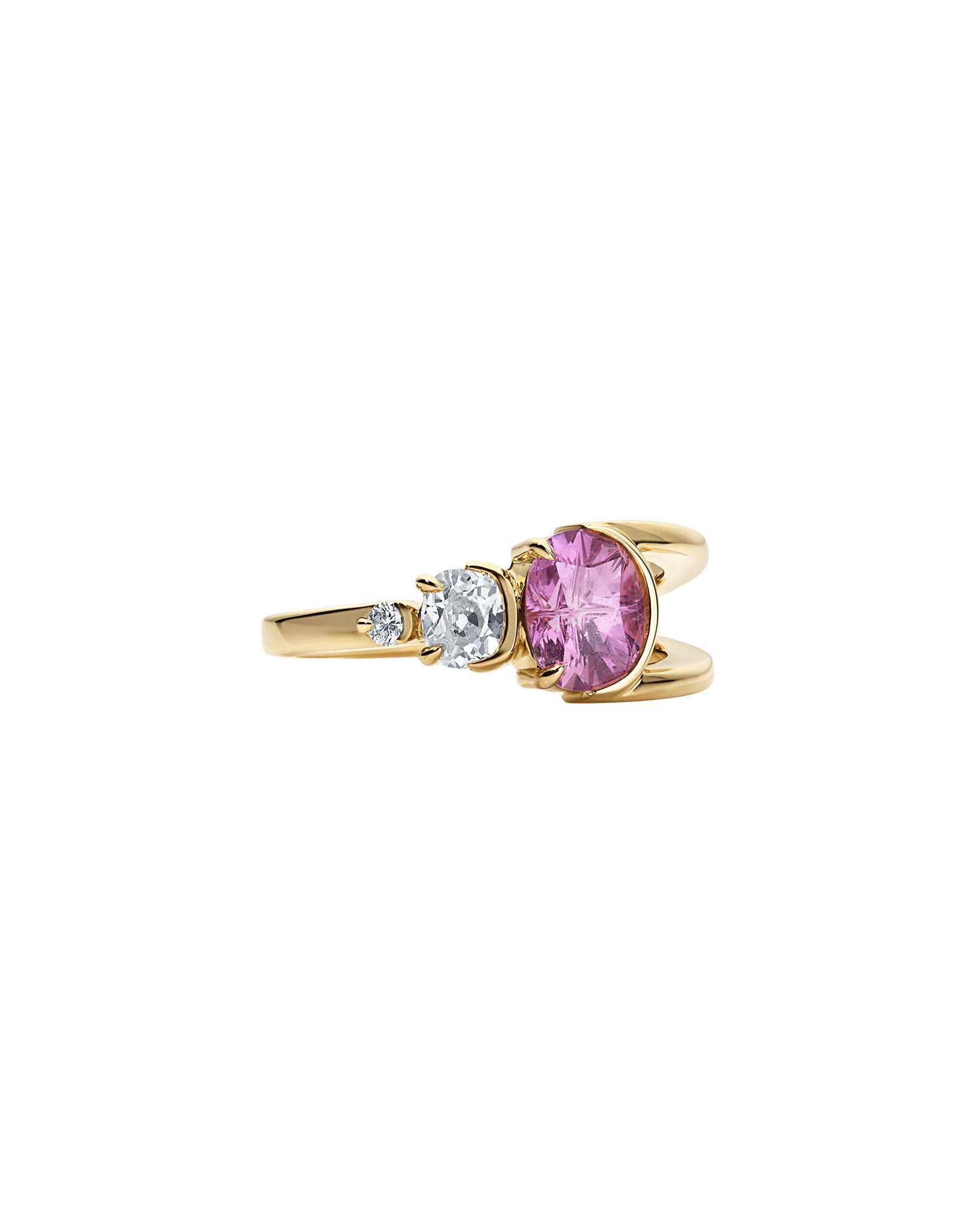 Elegant Bright Ring Pink Sapphire with a unique oval cut, highlighting its exquisite pink sapphire and diamond accents, perfect for sophisticated style.