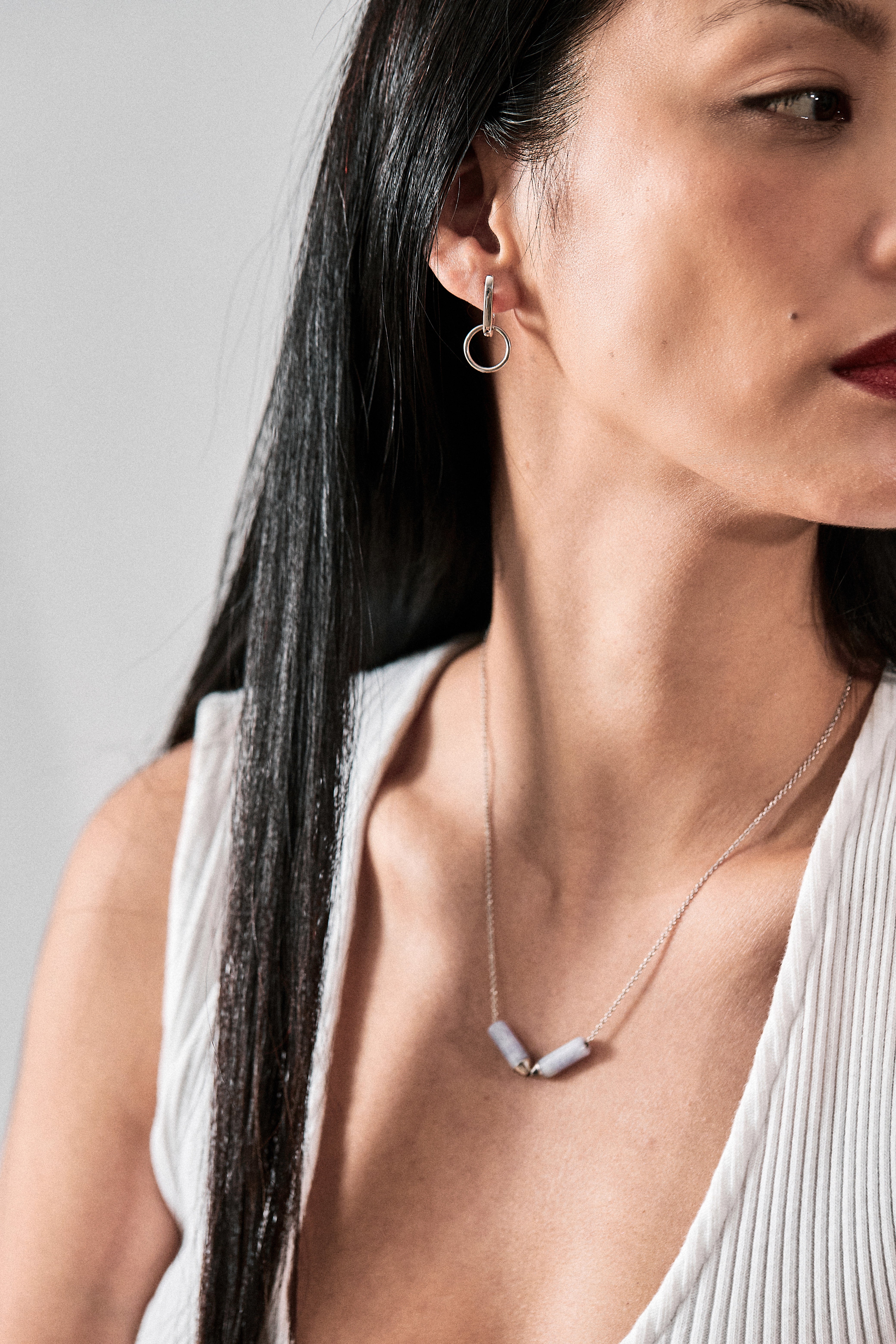 Model adorned with the Open Necklace - Mayan Lavender Jade and Platinum, complemented by matching accessories, exuding sophistication and timeless elegance.