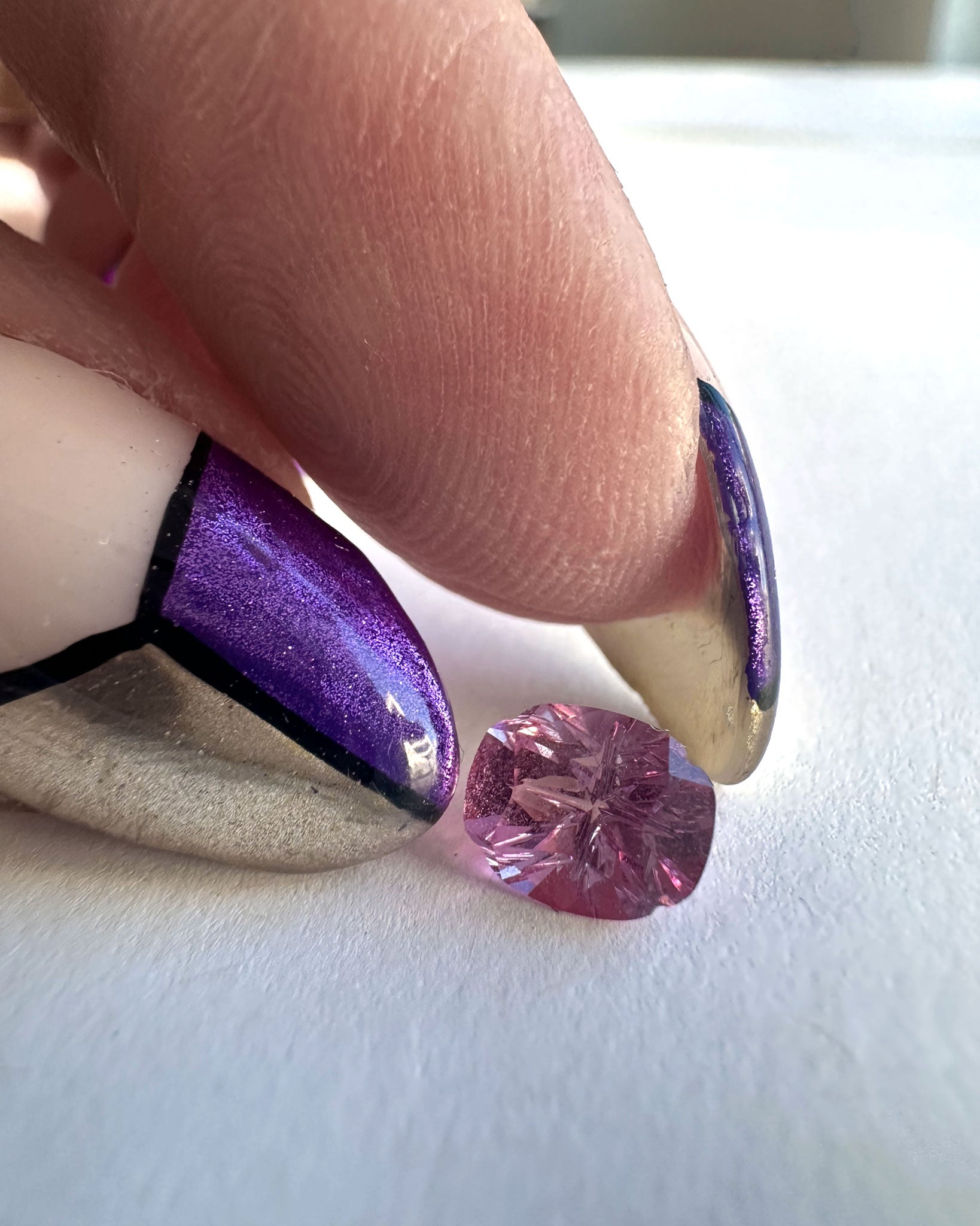 Close-up of a stunning pink sapphire gem intended for the Bright Ring Pink Sapphire, highlighting its brilliant color and cut for discerning collectors.