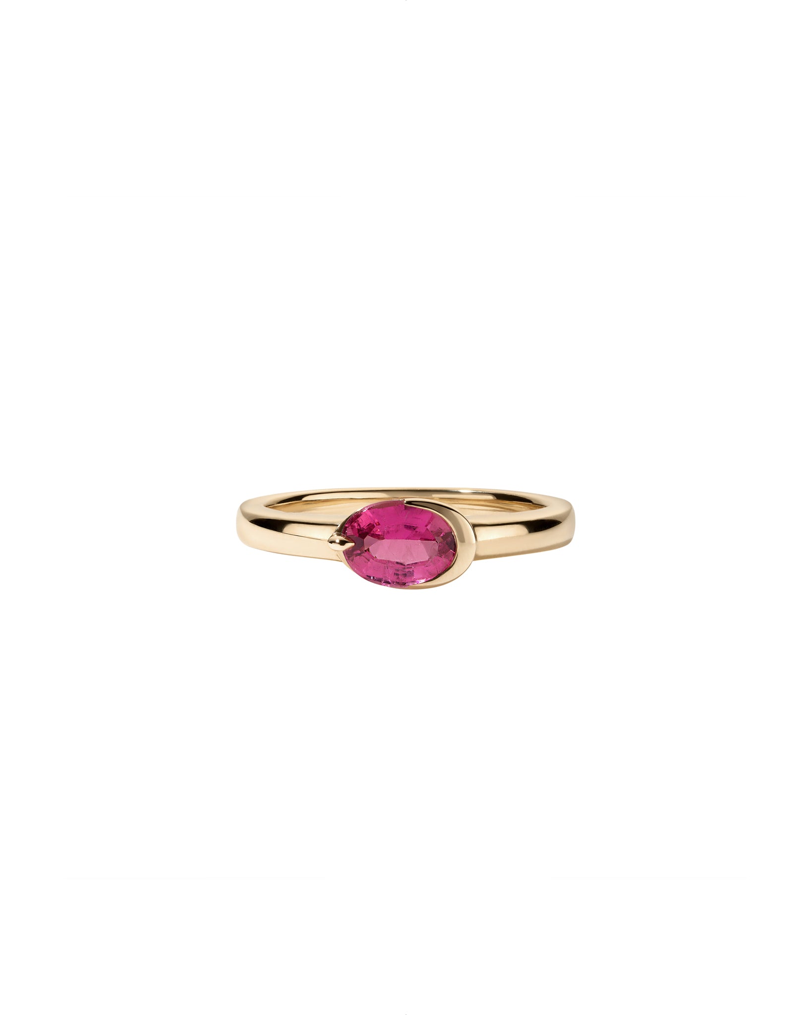Gold ring with a pink tourmaline gemstone on a white background inspired by the moon