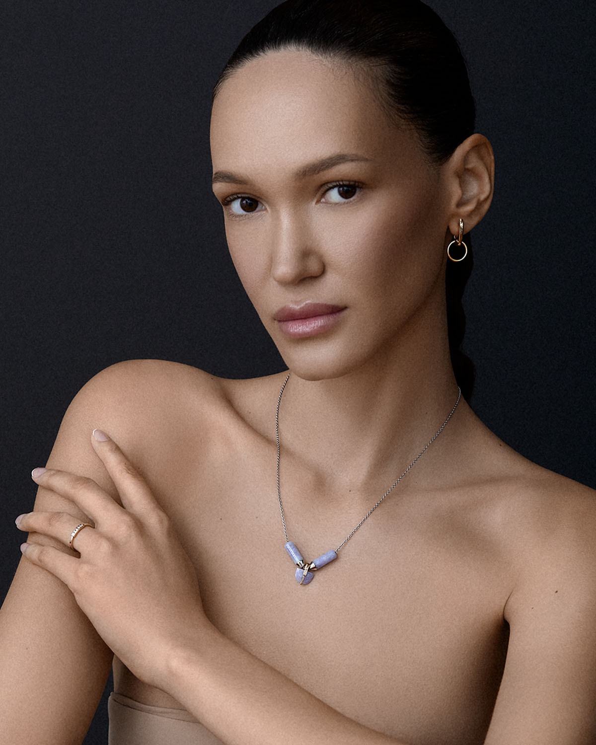 model wearing bliss lau lavender jade open necklace with lavender jade brevity pendant.