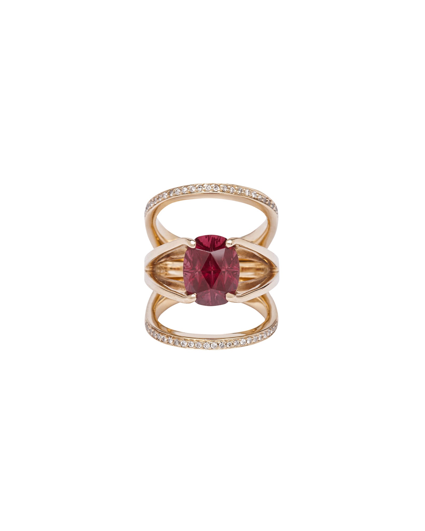 Acute 22mm Enclose + Centered Ring Set displaying a vibrant oval cut ruby in a beautiful gold setting with diamond accents, a true symbol of luxury.