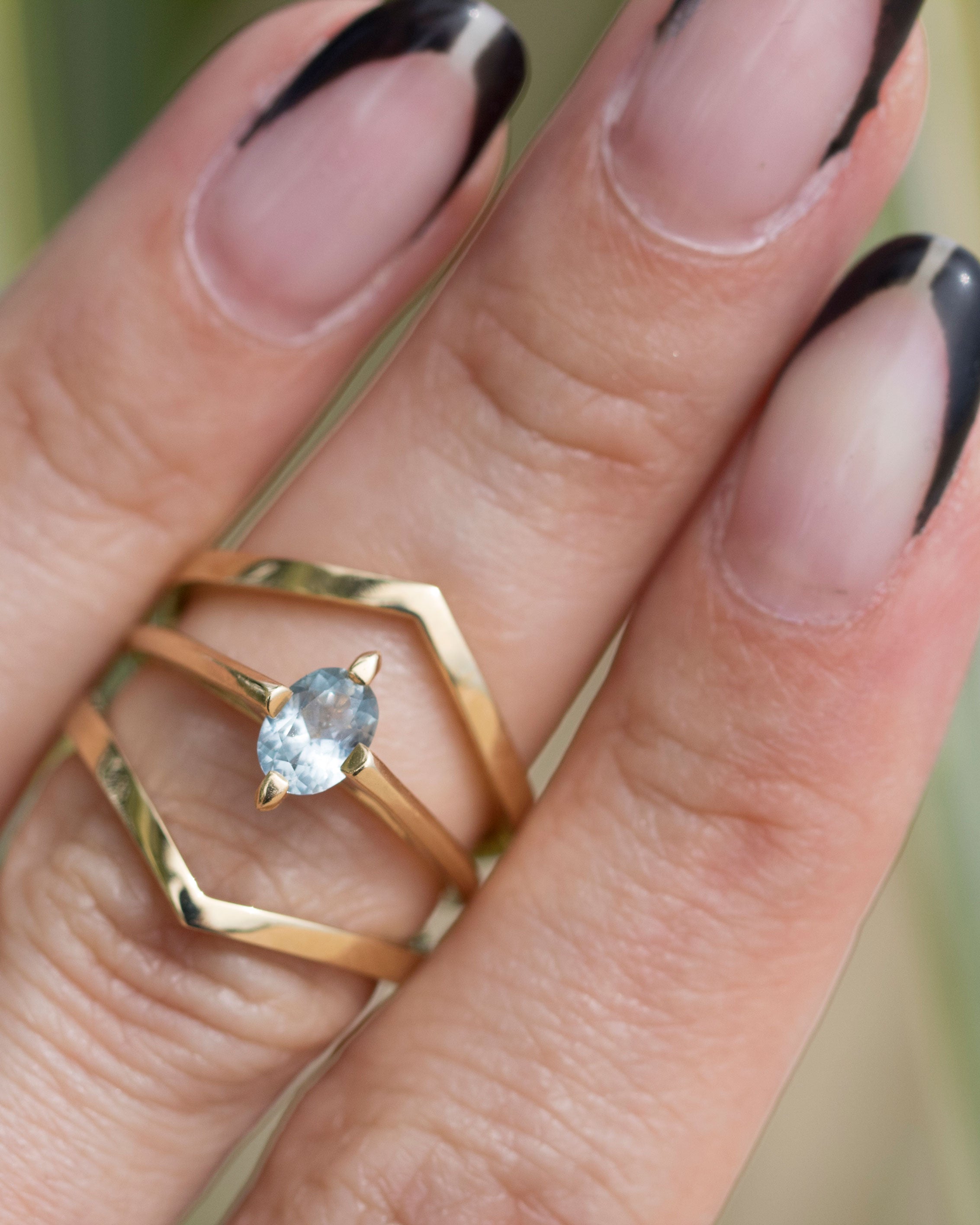 Gorgeous minimalist gold ring on display, representing Bliss Lau's commitment to simplicity through the minimalist arc, minimalist rise, and minimalist pave.