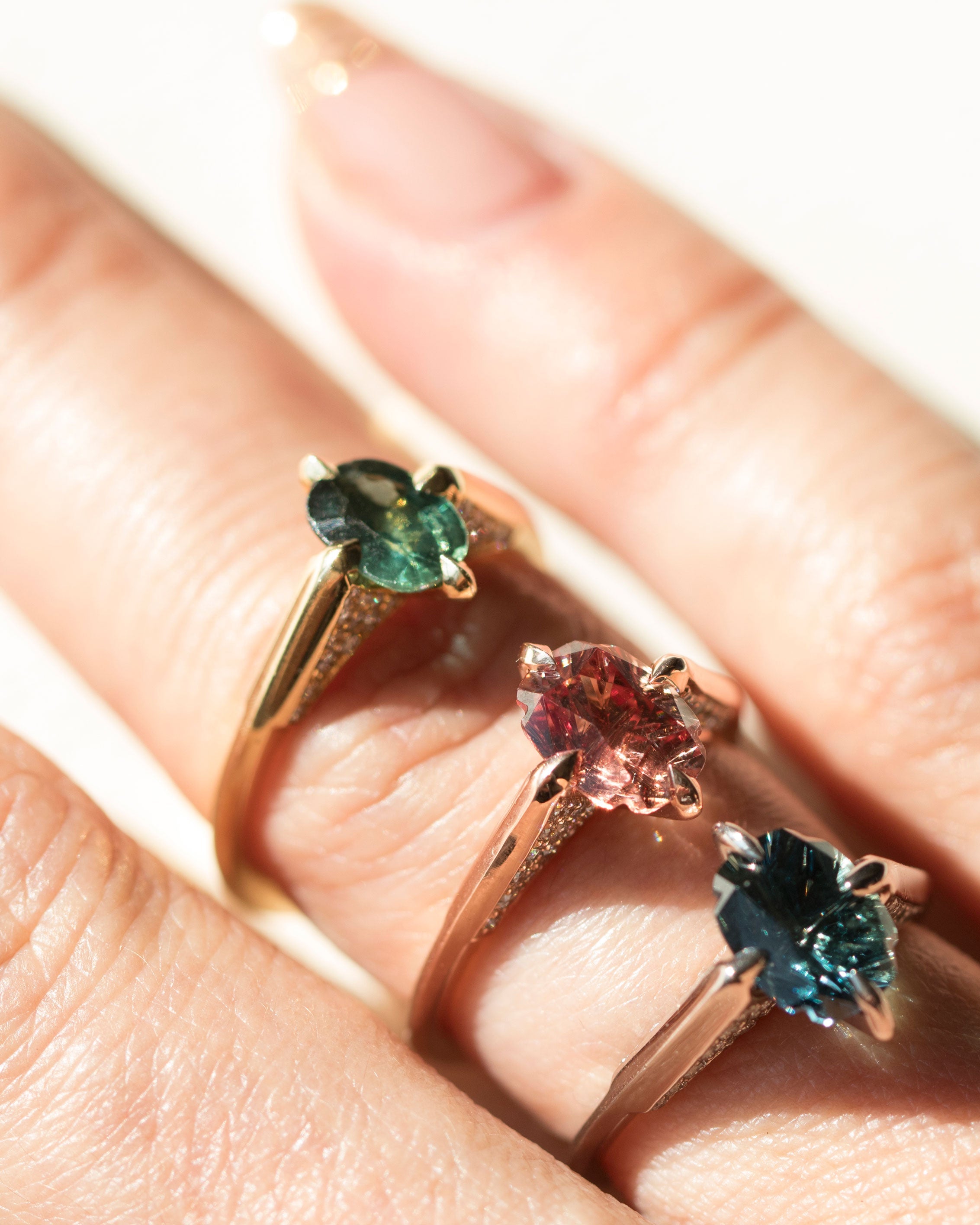 An elegant minimalist gold ring featuring a sparkling jewel, beautifully representing Bliss Lau's flair in minimalist arc, minimalist rise, and minimalist pave.