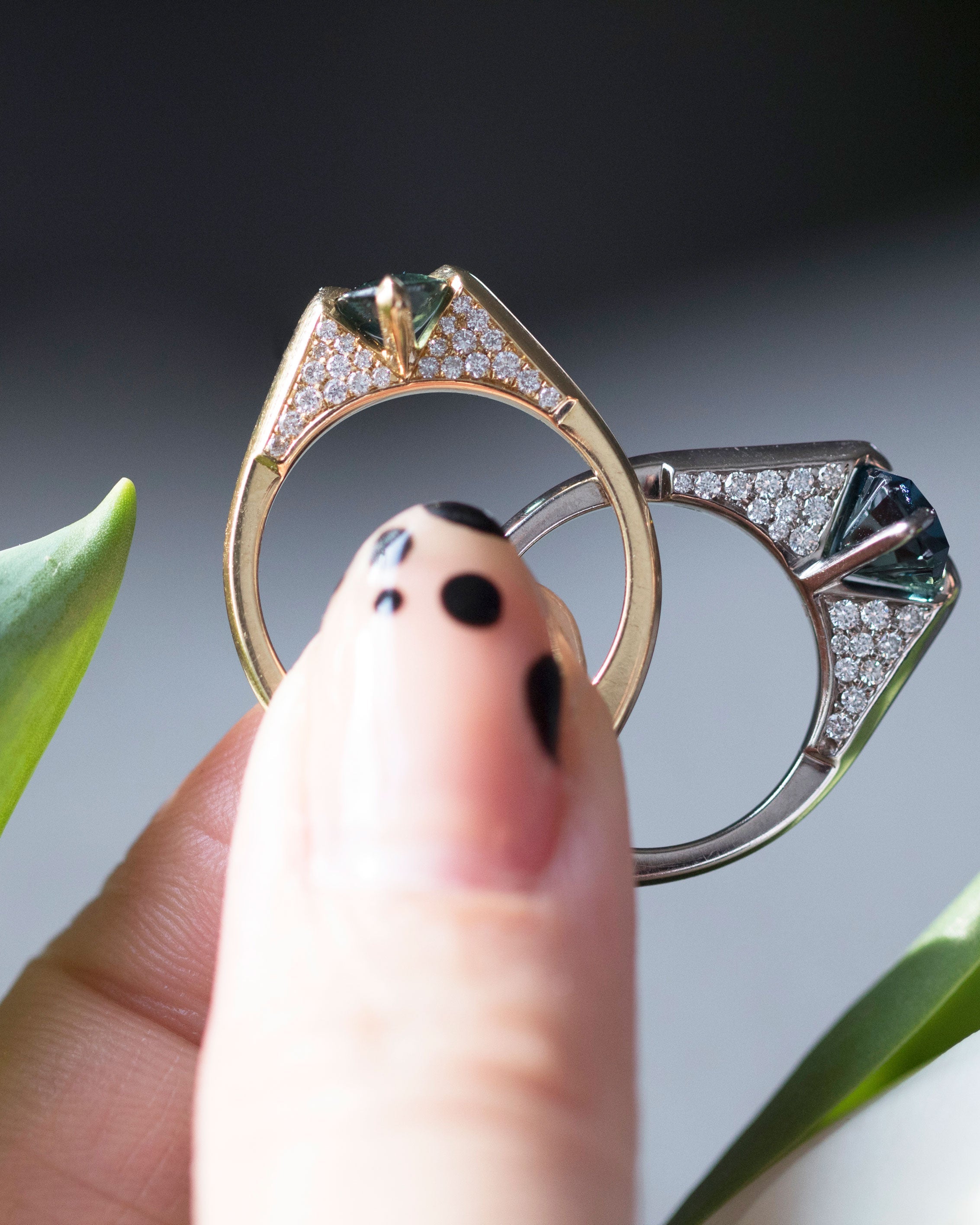 A simple yet beautiful minimalist gold ring in focus, reflecting the craftsmanship behind Bliss Lau's minimalist arc, minimalist rise, and minimalist pave style.
