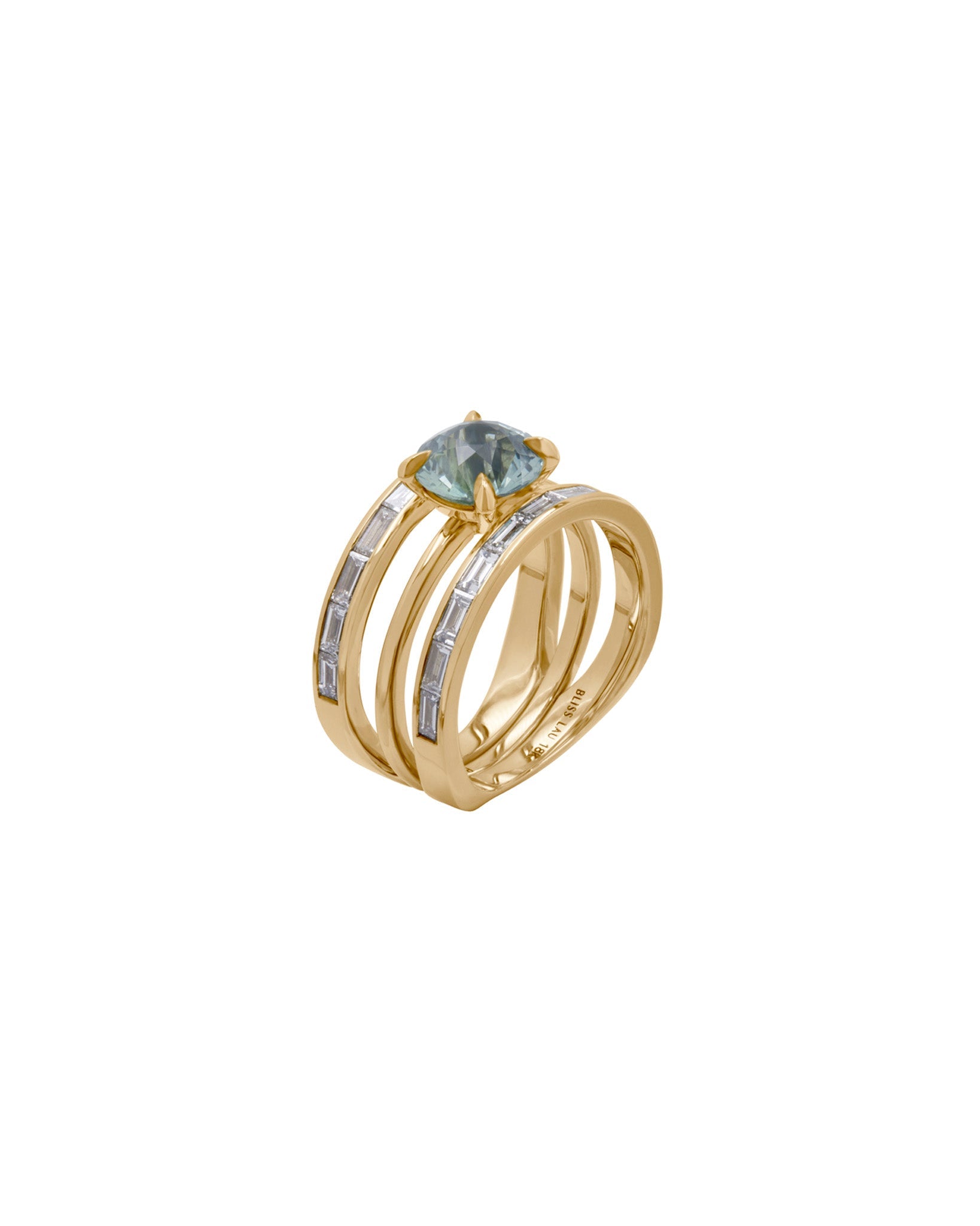 Three quarter view of Poetic Engagement Ring with cascade enclose ring with two bands of diamond baguettes. interlocking ring set.