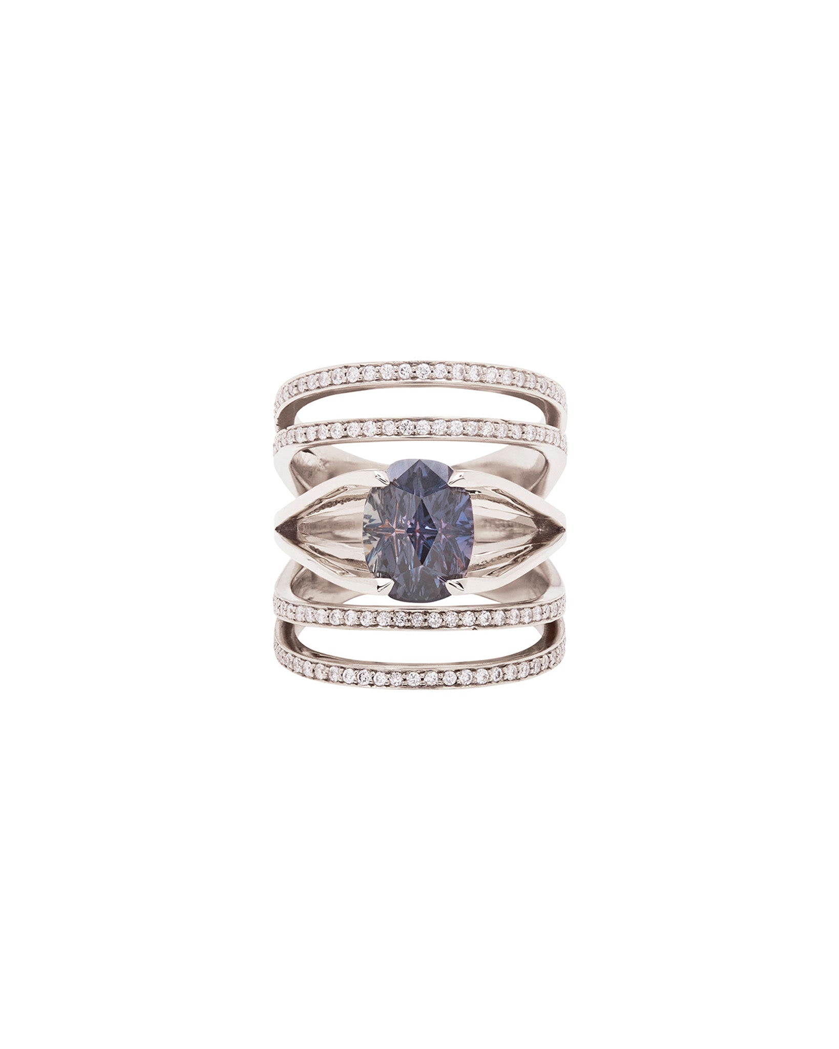 Stunning Elliptical Enclose Ring Set + Centered Ring crafted in white gold, adorned with a blue violet sapphire and diamonds, representing timeless elegance.