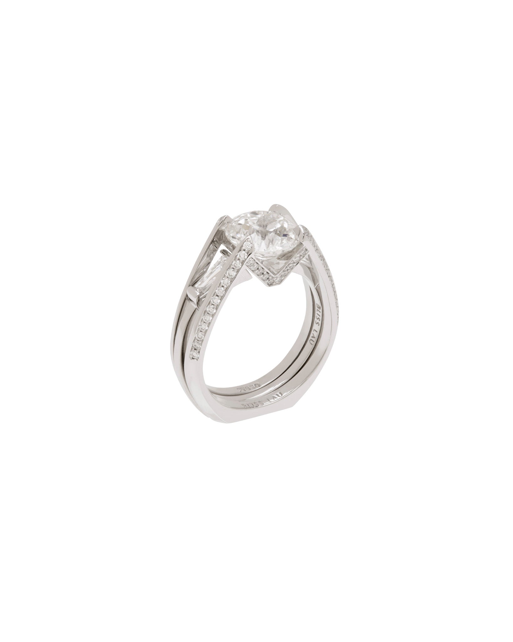 Futurist Engagement Ring Signature Collection featuring a stunning round diamond set in a sweeping double band, exquisitely crafted in white gold.