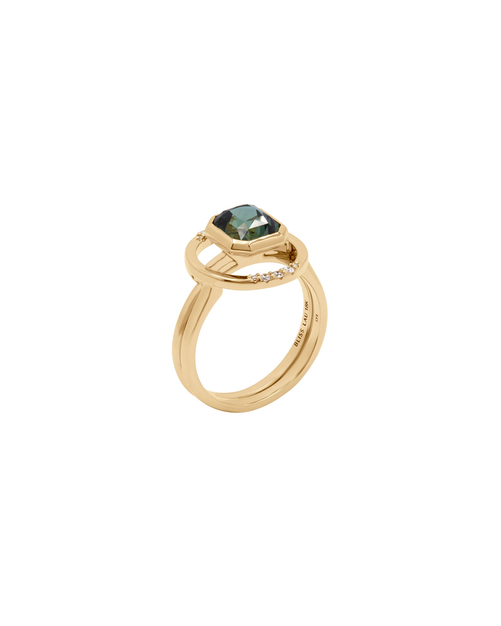 Royale Ring Set displaying a captivating green gemstone set in a luxurious gold band, complemented by a delicate diamond accent.