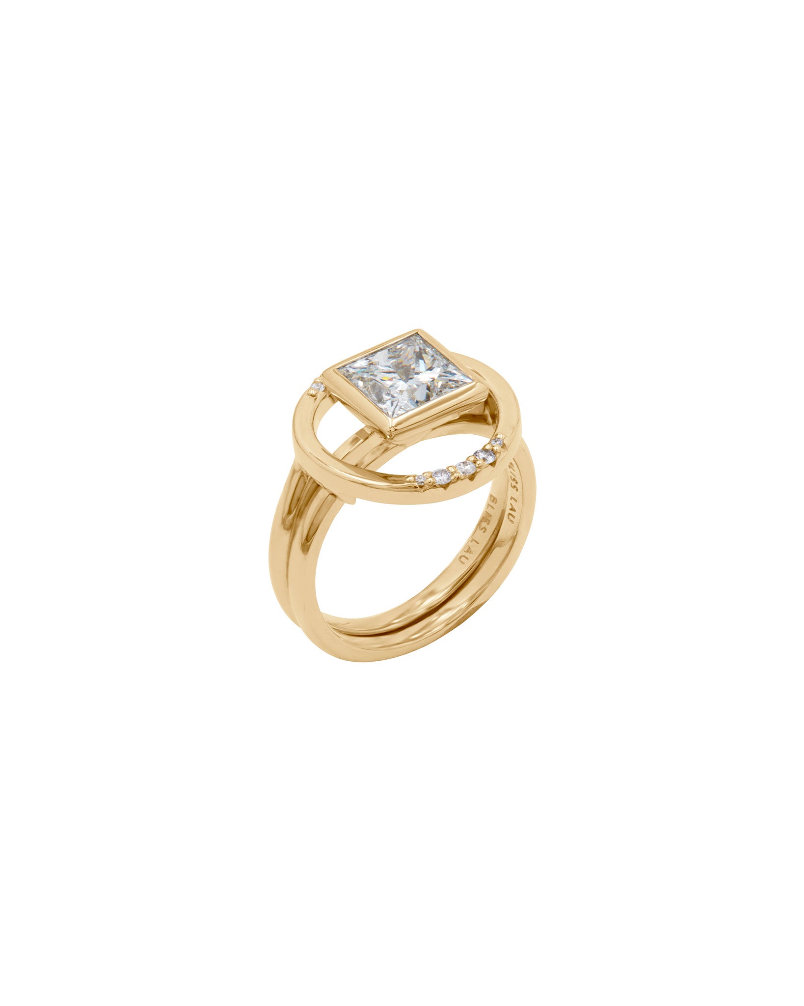 Royale Ring Set highlighting the elegant design of a square-shaped diamond surrounded by a delicate band of diamonds in a refined gold setting.