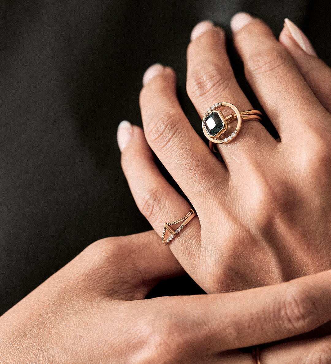 the pefect jewerly gift Close up of woman's hand with cusp ring by bliss lau