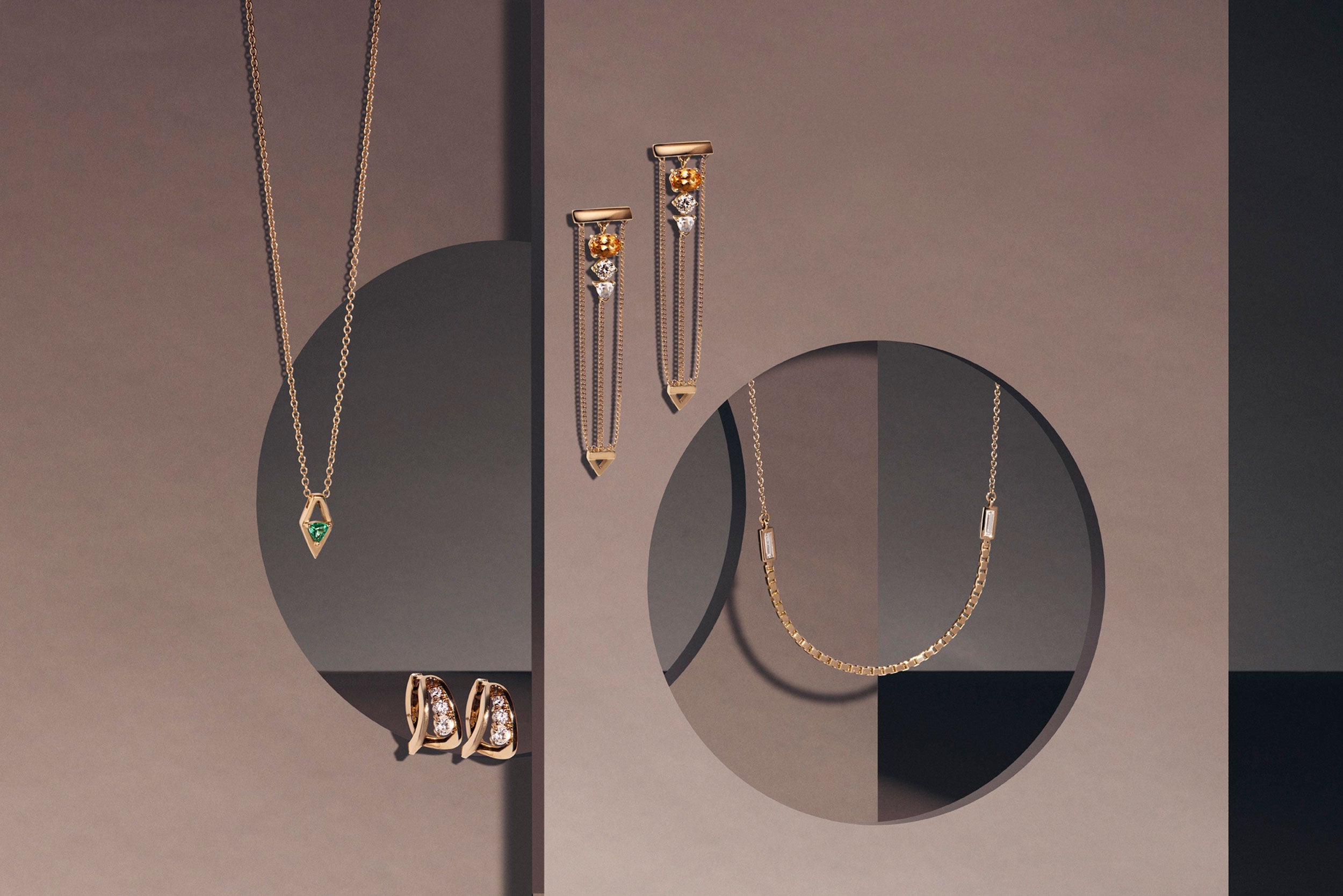 woman wearing halo necklace and halo luna necklace in 18K gold also wearing a custom engagement ring. 