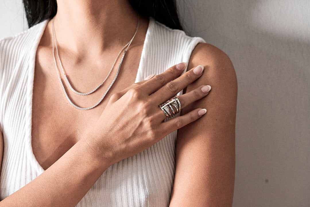 Model wearing fine jewelry from Bliss Lau
