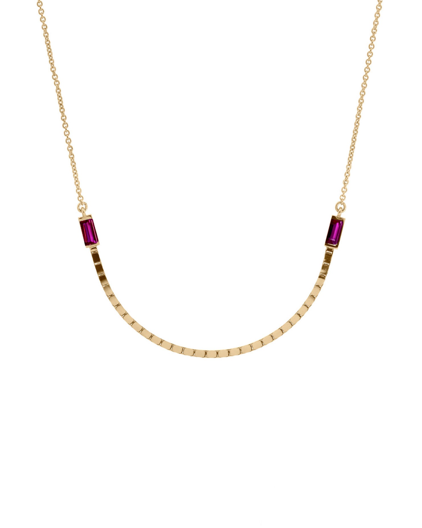 Gold necklace with red gemstones on a white background