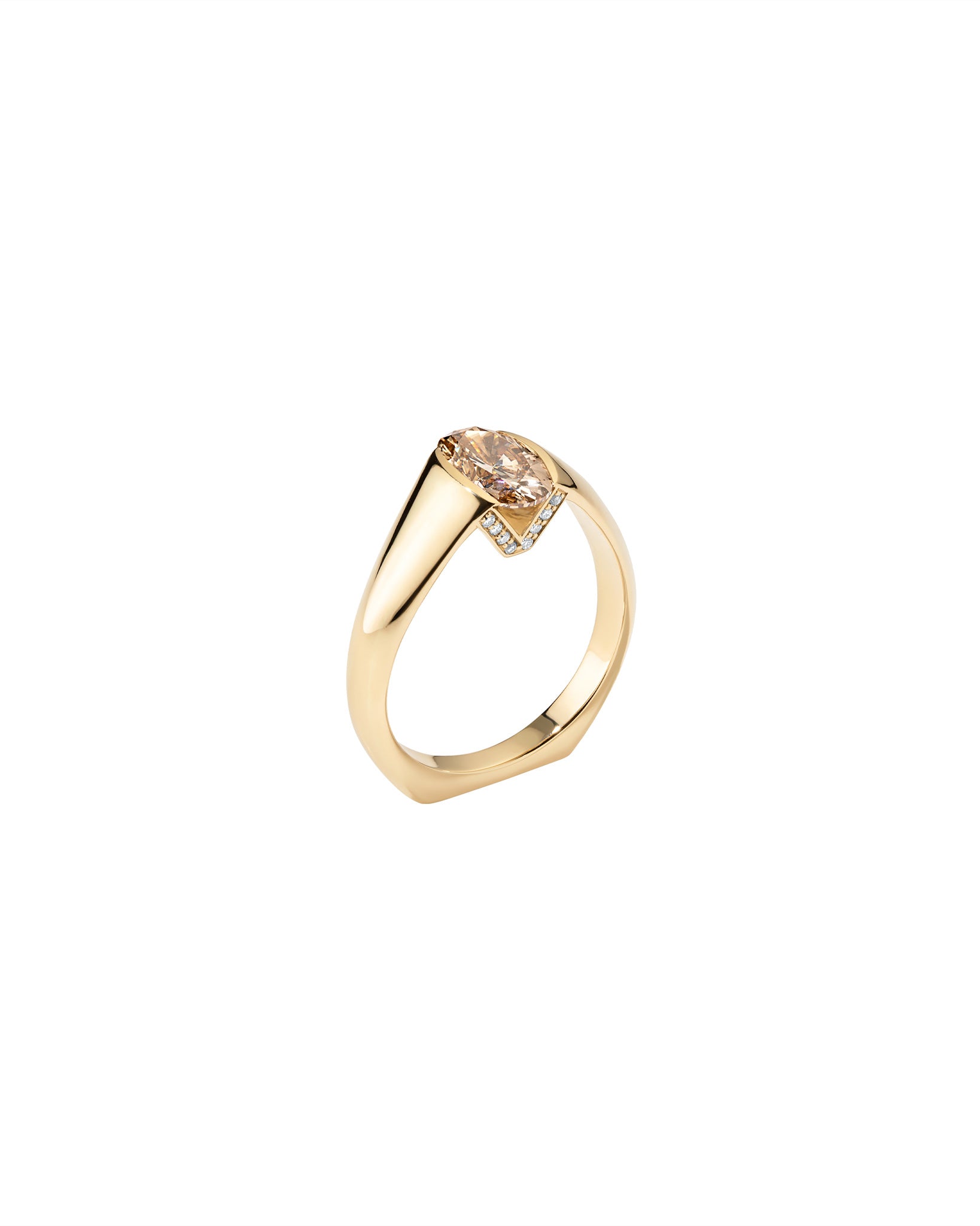 Gold ring with a Champagne diamond on a white background