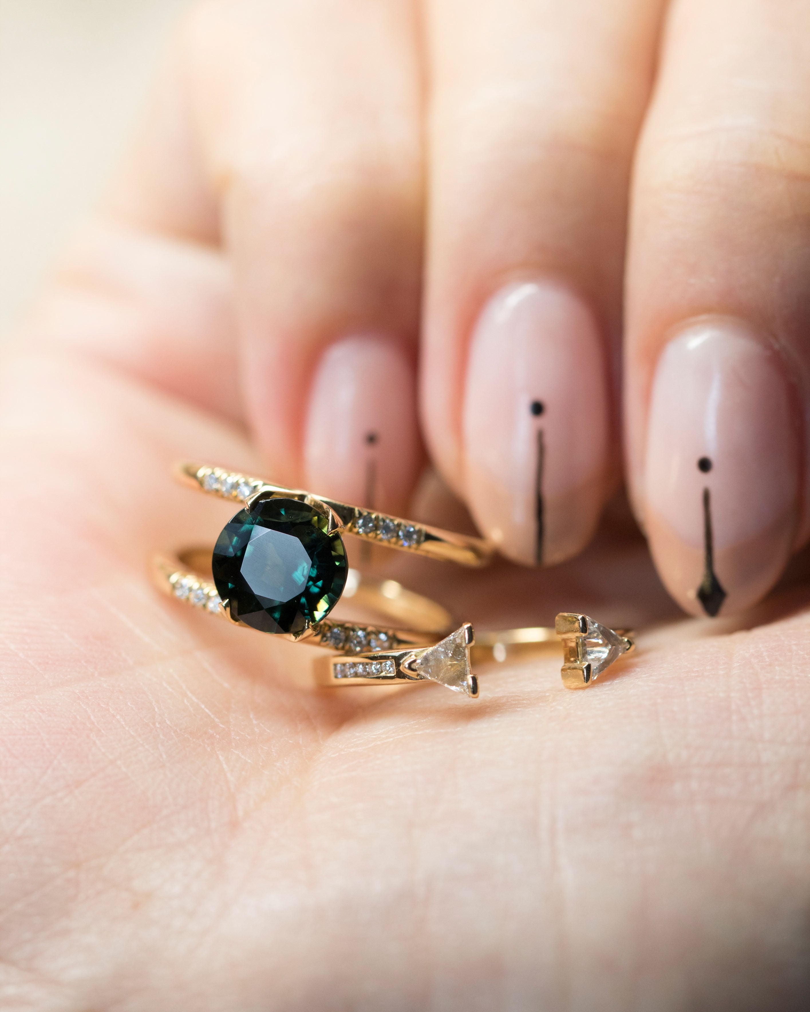 Bliss Lau magnetic and illuminate ring in hand. 