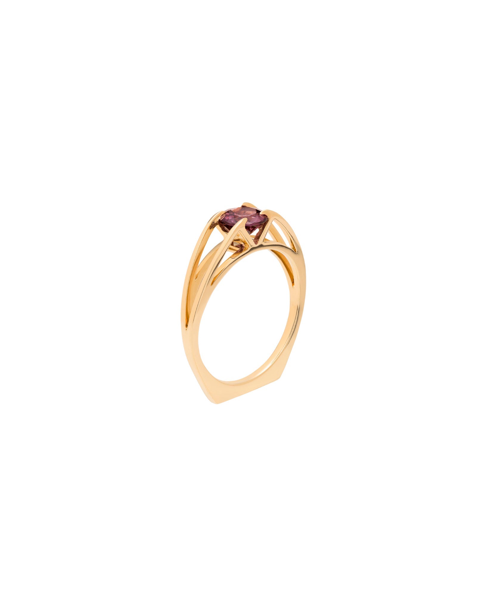 Centered Ring by Bliss Lau, is a gold band with a circular center stone