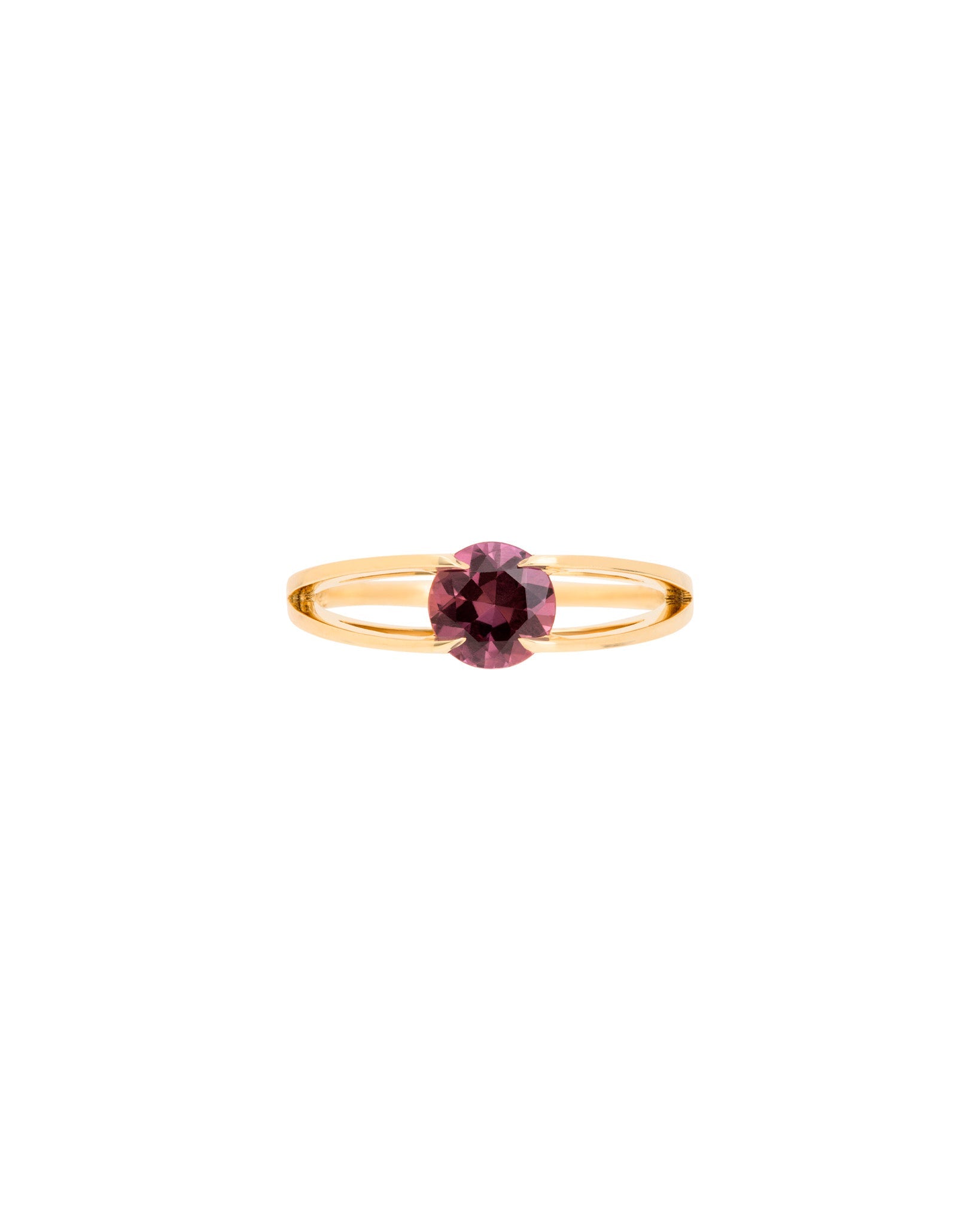 Centered Ring by Bliss Lau, is a gold band with a circular center stone