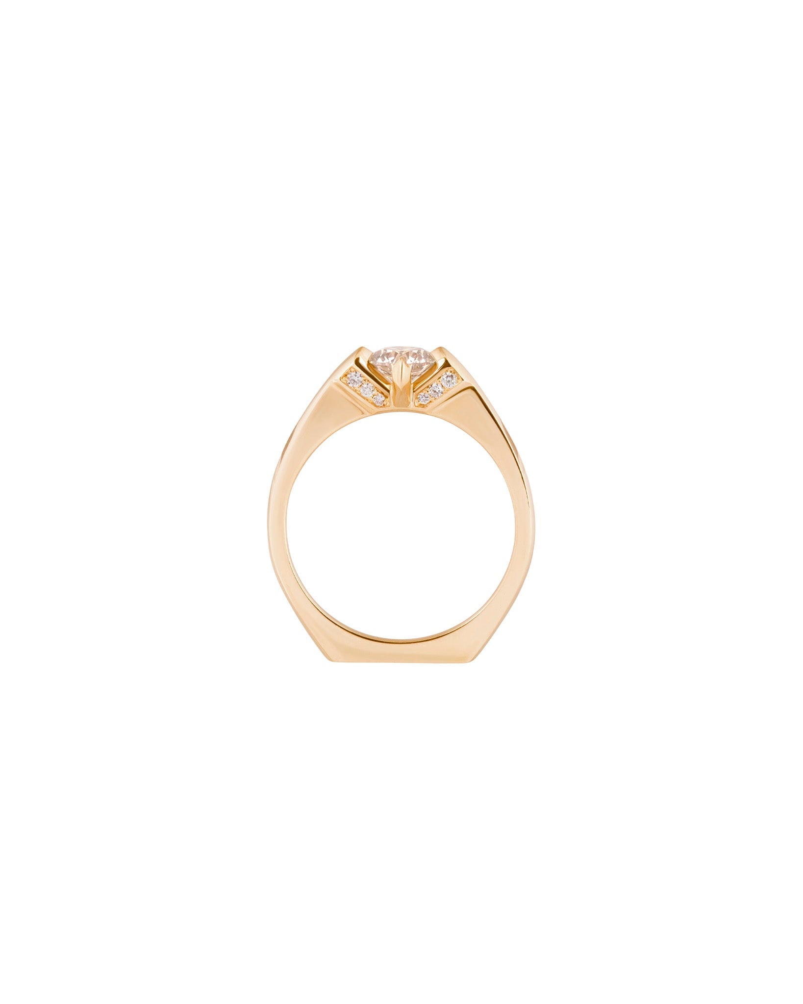 Minimalist gold rings captured from a unique angle, displaying the beauty of Bliss Lau's craftsmanship in minimalist arc, minimalist rise, and minimalist pave.