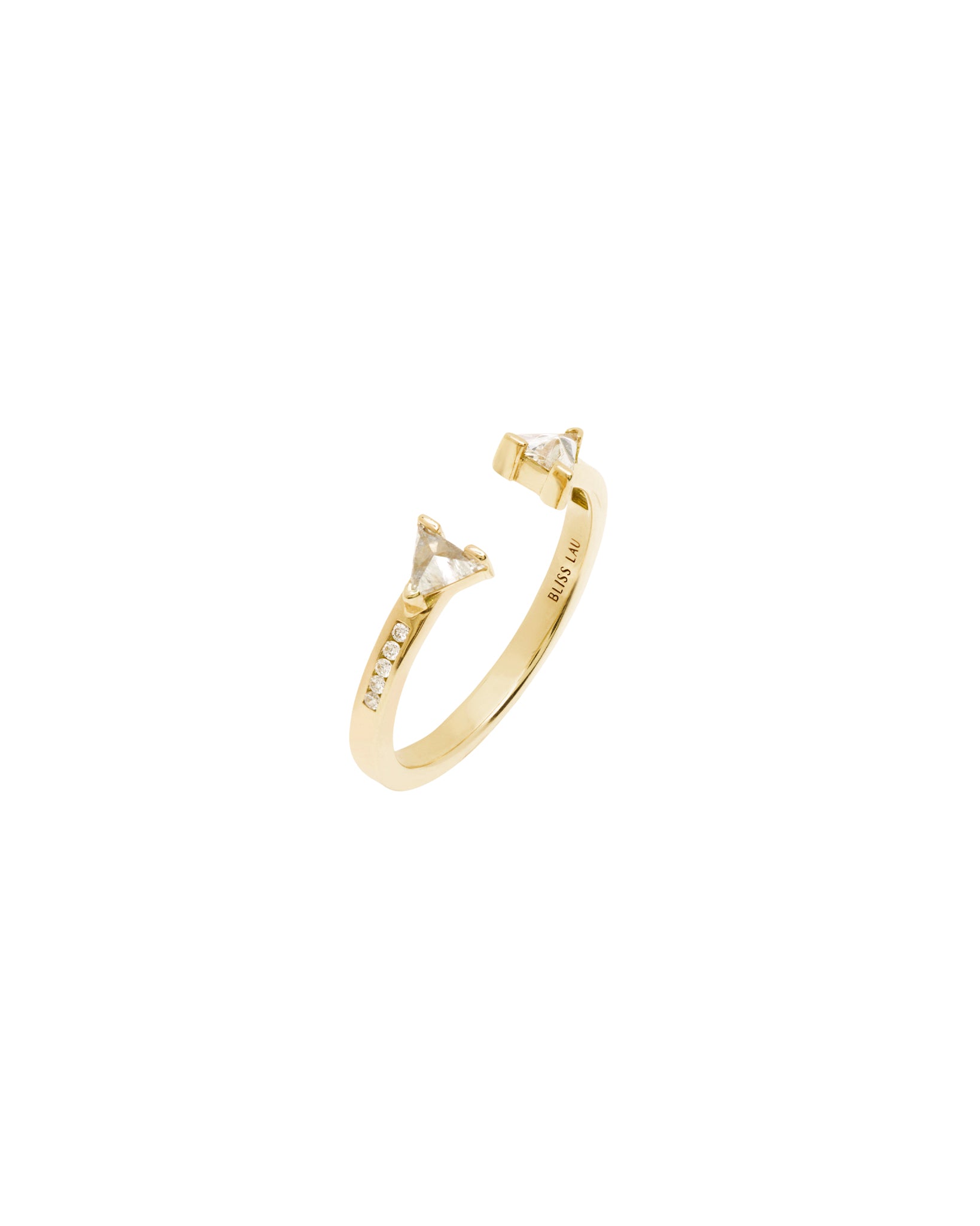 three quarter view of yellow gold magnetic band with diamond pave. 